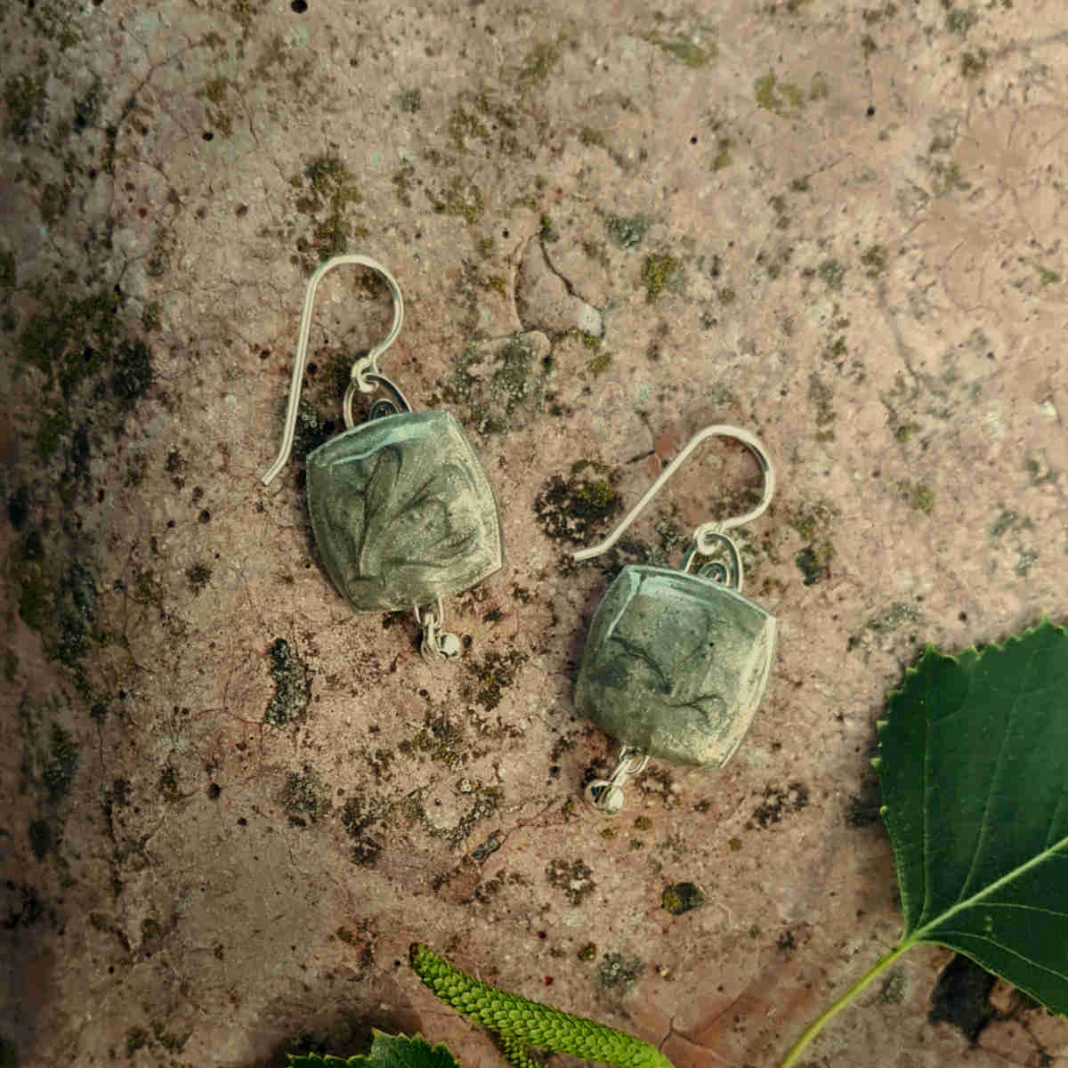 back of "square + bead" style birch bark earrings with silver